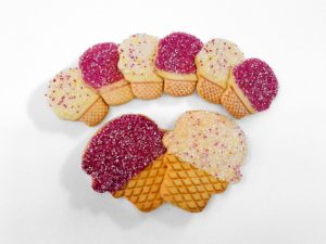 A photo of cookies that are made to look like ice cream cones.